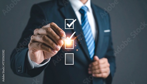 Businessman using pen to tick correct sign mark in checkbox for quality document control checklist and business approve project concept.