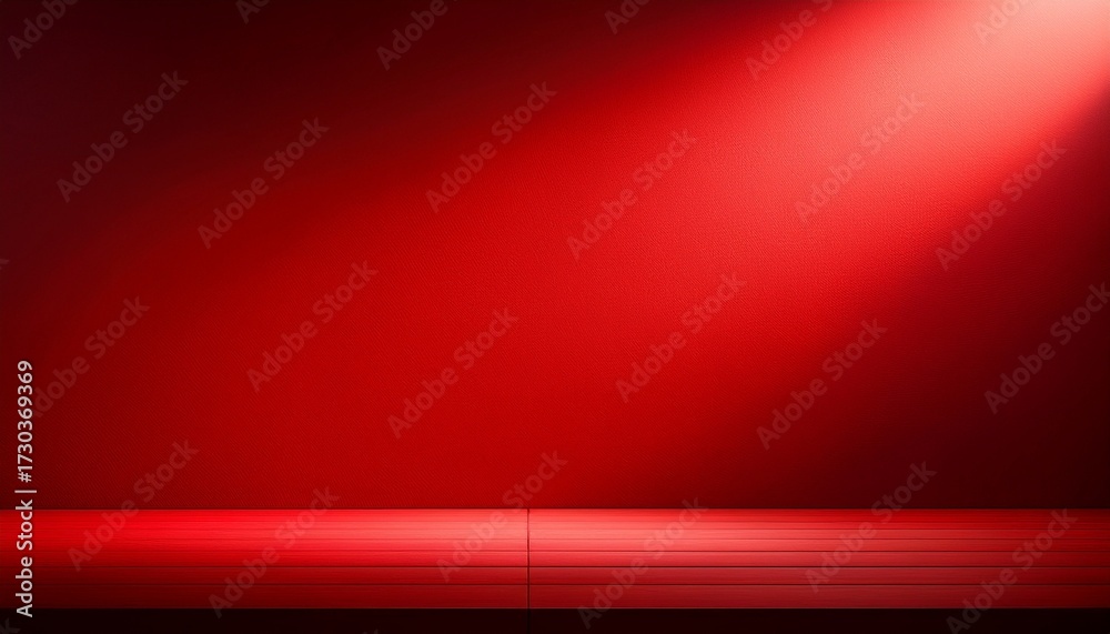 Obraz premium An Empty Red Wall Ideal For Product Presentations Or Mockups Enhanced With Chiaroscuro Lighting
