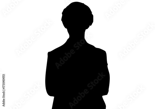 腕組みをする男性のシルエット