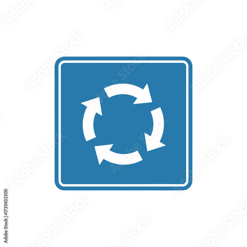 Blue roundabout sign indicating circular intersection ahead on a clear day, warning drivers to prepare for merging traffic and navigate the junction safely.