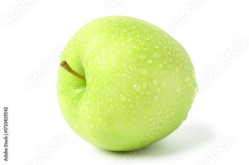 Green apple with water droplets lying on its side. isolated on white background.