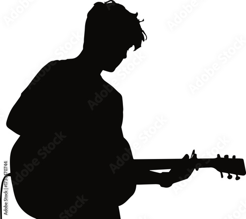 Silhouette of musician playing acoustic guitar, creating emotional music and artistic performance for any creative project