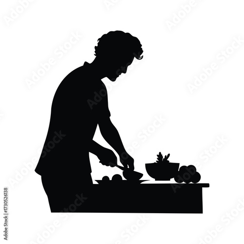 Silhouette of a cook preparing food at a table in the kitchen, chopping vegetables silhouette vector illustration