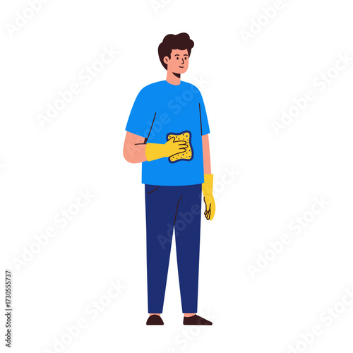 Young man in blue t-shirt and yellow gloves cleaning with a cloth