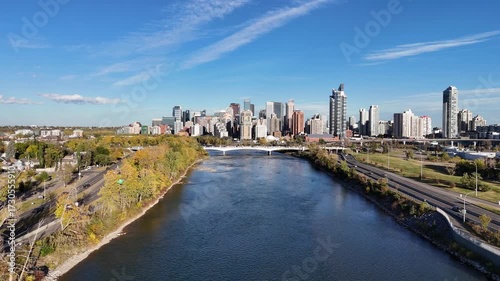 Aerial view of Calgary's downtown from along the Bow River on the west side of downtown looking east close to Memorial Drive. 