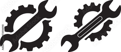 Two wrench and gear icons silhouette