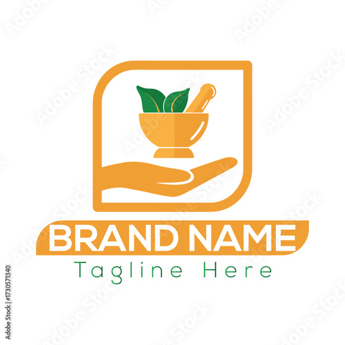 Orange hand holding mortar pestle with green leaves for ayurvedic logo ayurveda brand