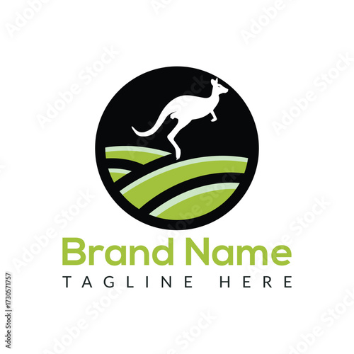White kangaroo leaping over green rolling hills in black circle logo design jumping marsupial