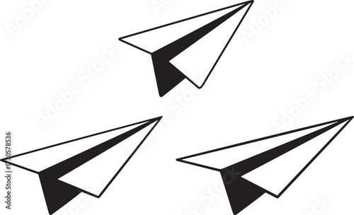 Three paper airplanes flying together silhouette