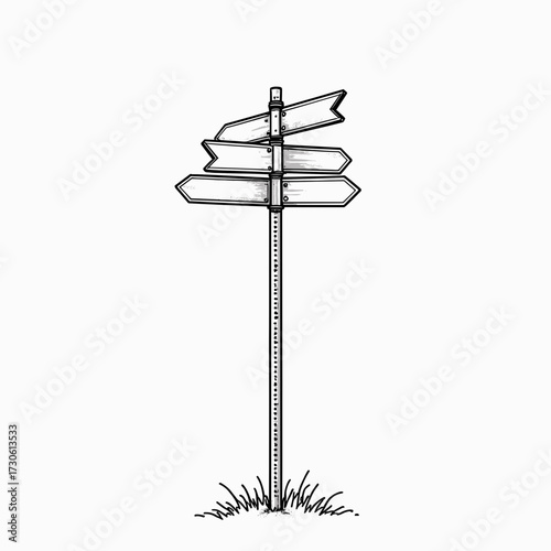 Directional signpost with multiple arrows on grassy ground  