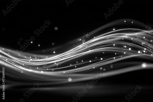 Abstract flowing light patterns in black and white showcasing elegance and motion
