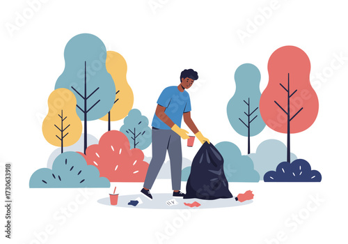 A man cleans up litter in a park with trees and bushes in the background
