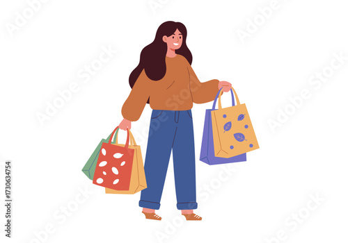 A woman holds shopping bags with leaves on some of the bags