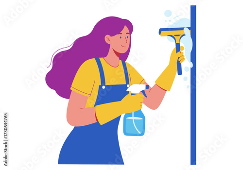 A woman in blue overalls and yellow gloves cleans a surface with spray and a squeegee