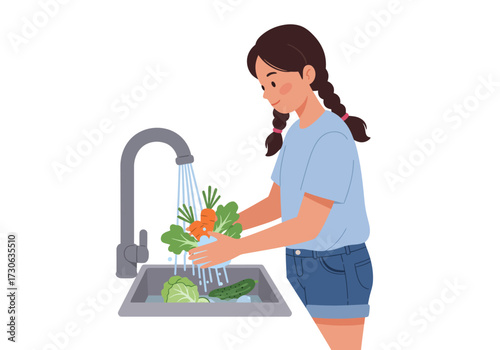 Girl washes carrots  lettuce in sink cucumber  cabbage visible