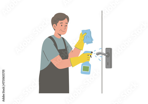 Man wearing gloves cleans a doorknob using a spray bottle and a cloth