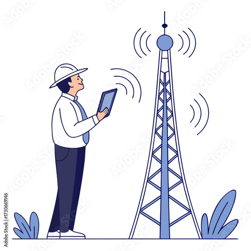 Engineer in hard hat using tablet to monitor signal transmission from a tall communication tower