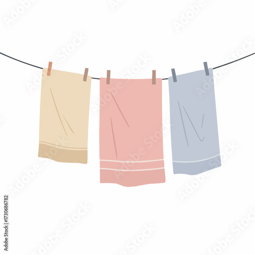 Colorful towels hanging on a clothesline in minimal style  