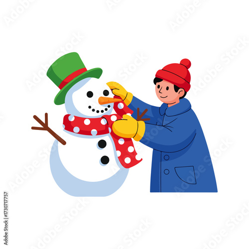 A young boy in a blue winter coat and red hat builds a snowman with a green top hat and a polka-dot scarf.
