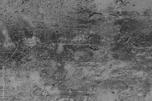 Rugged grayscale concrete wall surface with rough texture and subtle variatio...