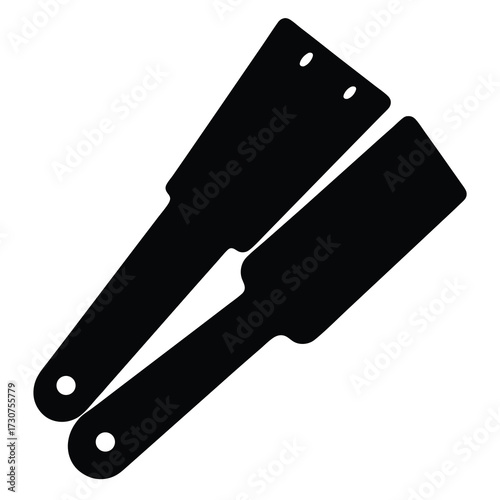 Two offset black silicone spatulas for cooking and baking preparation