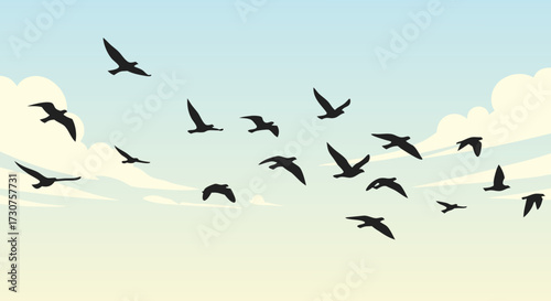 A flock of birds soaring gracefully across a soft, cloudy sky, evoking a sense of freedom and natural beauty in a serene outdoor setting