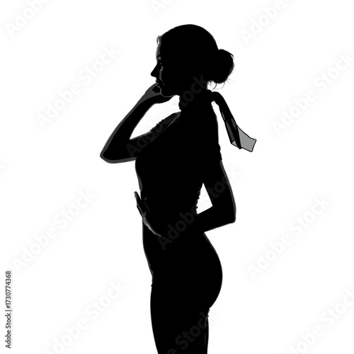 Woman in silhouette thinking while holding her chin with hand  