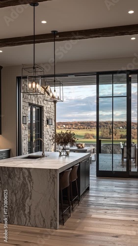 kitchen interior with dark cabinets large kitchen island with white marble and bar stools black hardwood floor pendant lighting window covering spacious modern construction home Vertical video reels