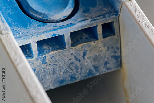 Behang Closeup of washing machine detergent drawer with residues – cleaning, repair and