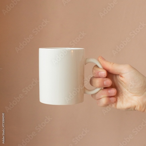 Hand Holding White Ceramic Coffee Mug Mockup on Minimal Background
