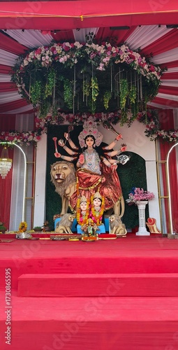 Idol of Goddess Devi Durga at a decorated puja pandal , Durga Puja is a famous and major religious traditional festival of Hinduism that is celebrated throughout the world.
