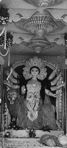 Idol of Goddess Devi Durga at a decorated puja pandal , Durga Puja is a famous and major religious traditional festival of Hinduism that is celebrated throughout the world.
