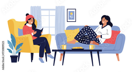 Two young women enjoying a cozy time indoors during winter.