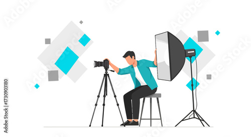 Professional photographer in studio with equipment and abstract geometric shapes photography