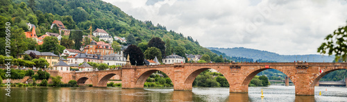 Heidelberg's historic Ernst-Walz-Brücke bridge shines in this July 2025 riverside.