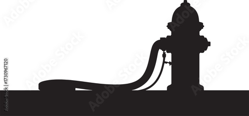 Black silhouette of a fire hydrant with a hose attached and lying on the ground black and white water