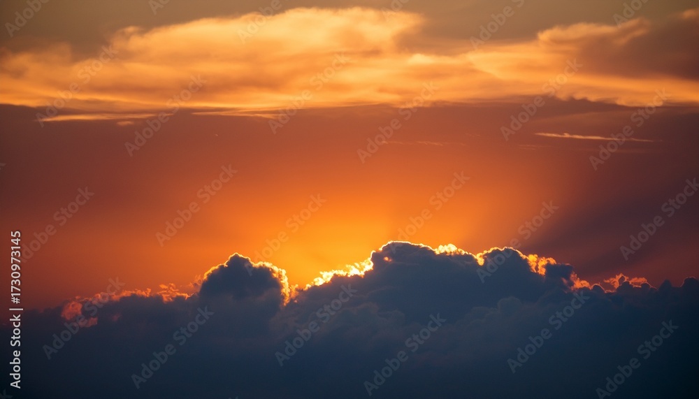 Obraz premium Sunset Behind The Cloud And Orange Sky