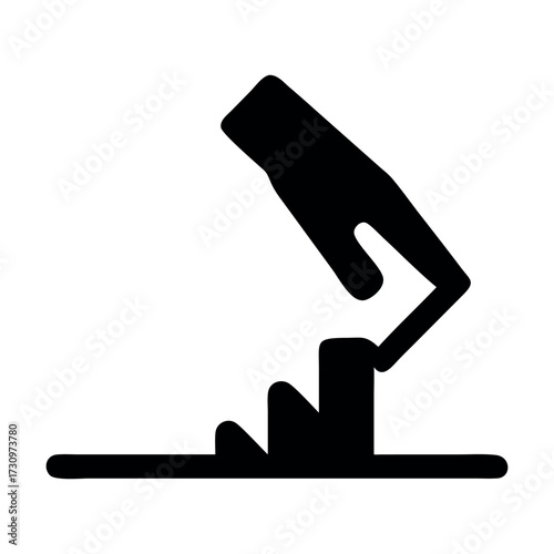 Stylized Hand Pressing a Wooden Block Against a Flat Surface a Symbol of Crafts and Creation