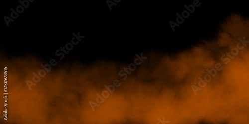 Hand made Abstract orange smoke on a black background a dynamic cloud of color perfect for backgrounds and special effects