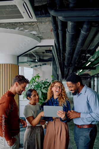 Quadro su tela Diverse business colleagues at office cheerfully collaborating and working toget
