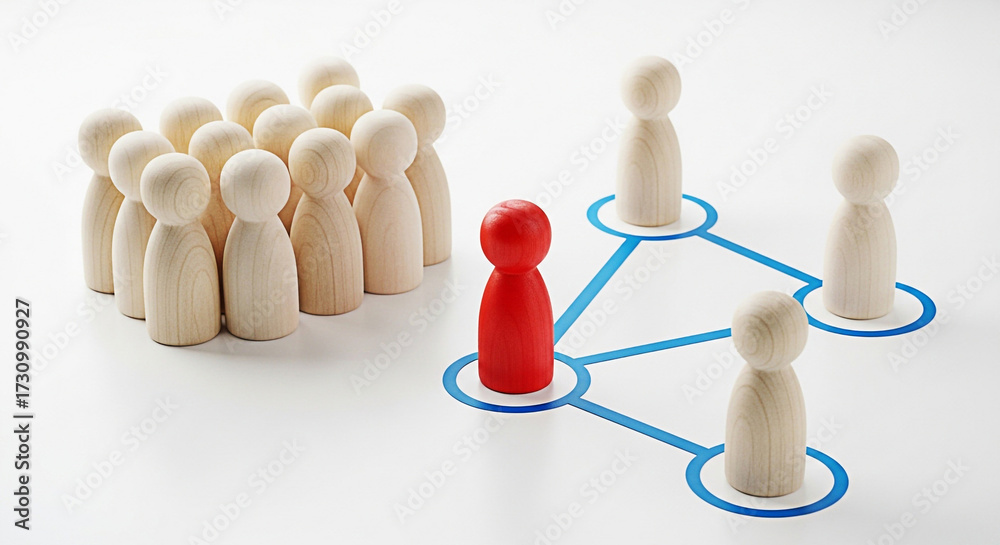 Obraz premium Red wooden figure leading a network of team members showing leadership and connection in business