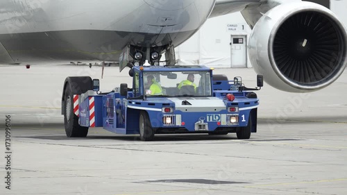 Preparing a passenger plane for departure at the busy airport