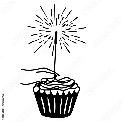 Hand placing sparkler onto cupcake for celebration  