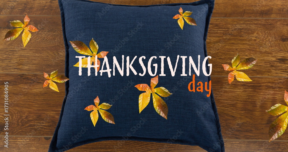 Fototapeta premium Image of thanksgiving day text over fall leaves and pillow