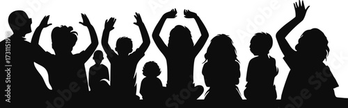 Group of silhouettes celebrating with raised hands in dark background  