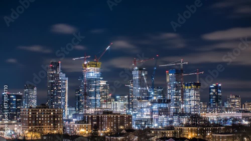 Wallpaper Mural Nighttime City Skyline with Illuminated Skyscrapers Under Construction Urban Development. Torontodigital.ca