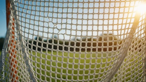 Lacrosse Goal Net Viewed From a Low Angle Under Bright Sunlight