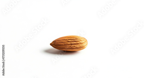 Single raw almond isolated on white background a healthy snack
