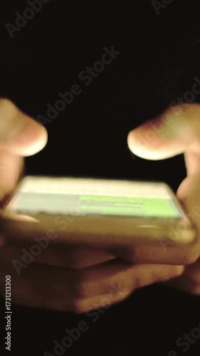 hands holding and typing on a smartphone