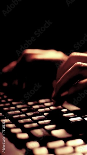 hands typing on a keyboard